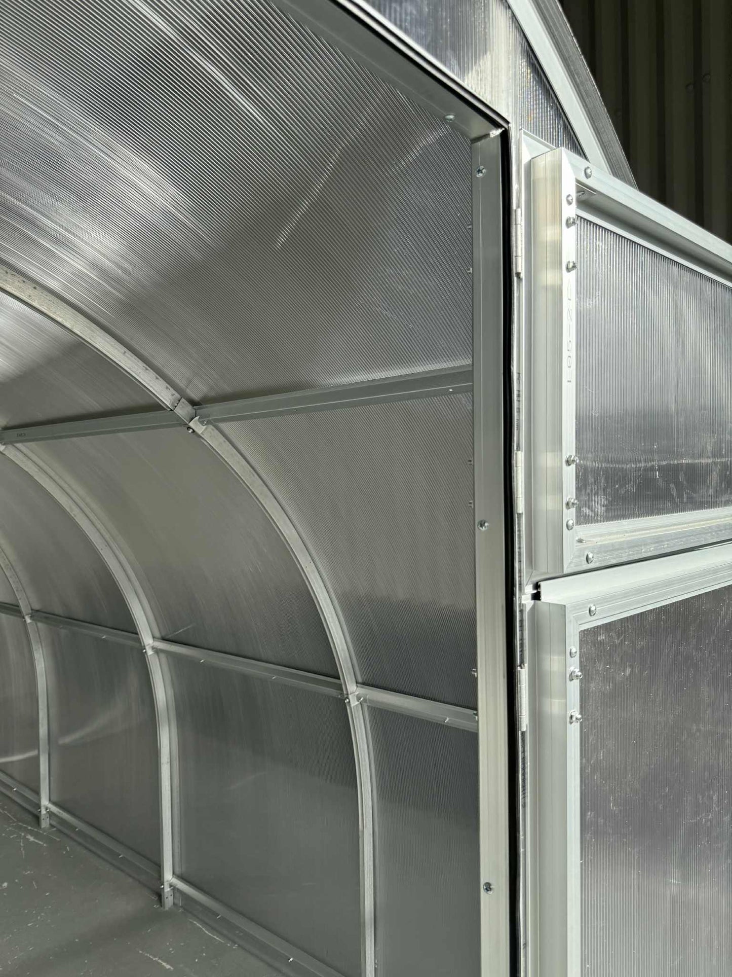 Close-up of a metal frame of a  Sigma 300 (Gen III) greenhouse.