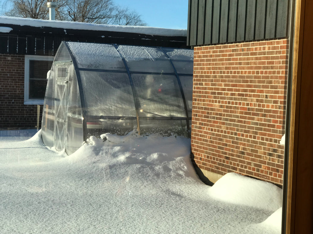Don't place your greenhouse near other structures