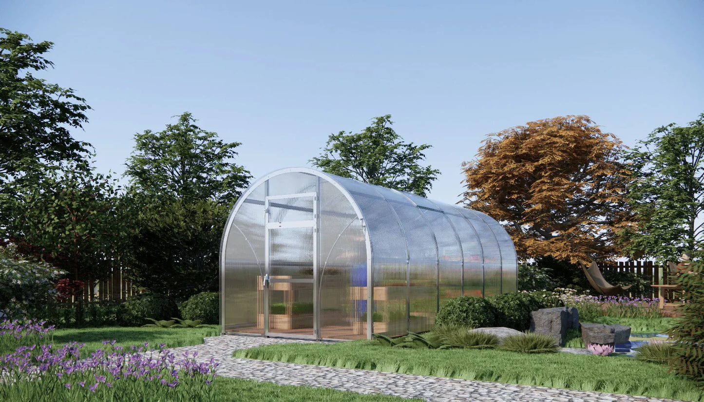 Sigma 250 (Gen III) Greenhouse in a garden with trees and flowers