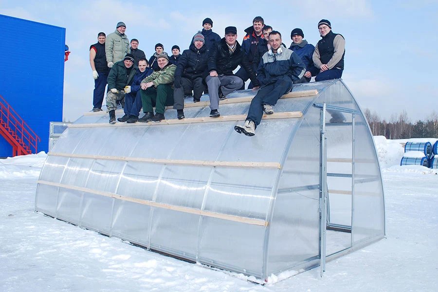 Load test: a team seated on a bell-shaped Sungrow roof